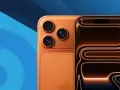 Två orangea iPhones, en med tre kameror och en med en dynamisk ö som visar en glödande design. Perfekt för dig som vill ha ett mobil med bra batteritid.