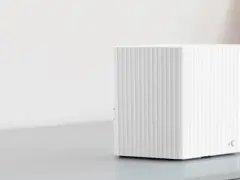 En vit, ribbad router som visar hur fungerar wifi.