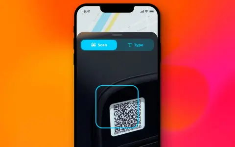 iPhone-app för att skanna koder. En QR-kod syns i bild, redo att skannas.
