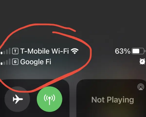 Telefonen visar T-Mobile Wi-Fi och Google Fi som tillgängliga nätverk för wifi samtal. Batteriet är på 63%.