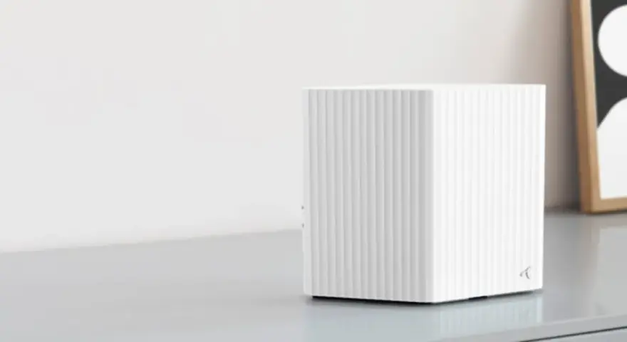 En vit, ribbad router som visar hur fungerar wifi.